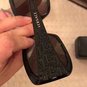 Black on black Versace sunglasses